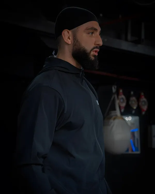 Youcef Oukacine in a dark training gym